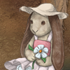 An adorable little western lady bunny doll.
